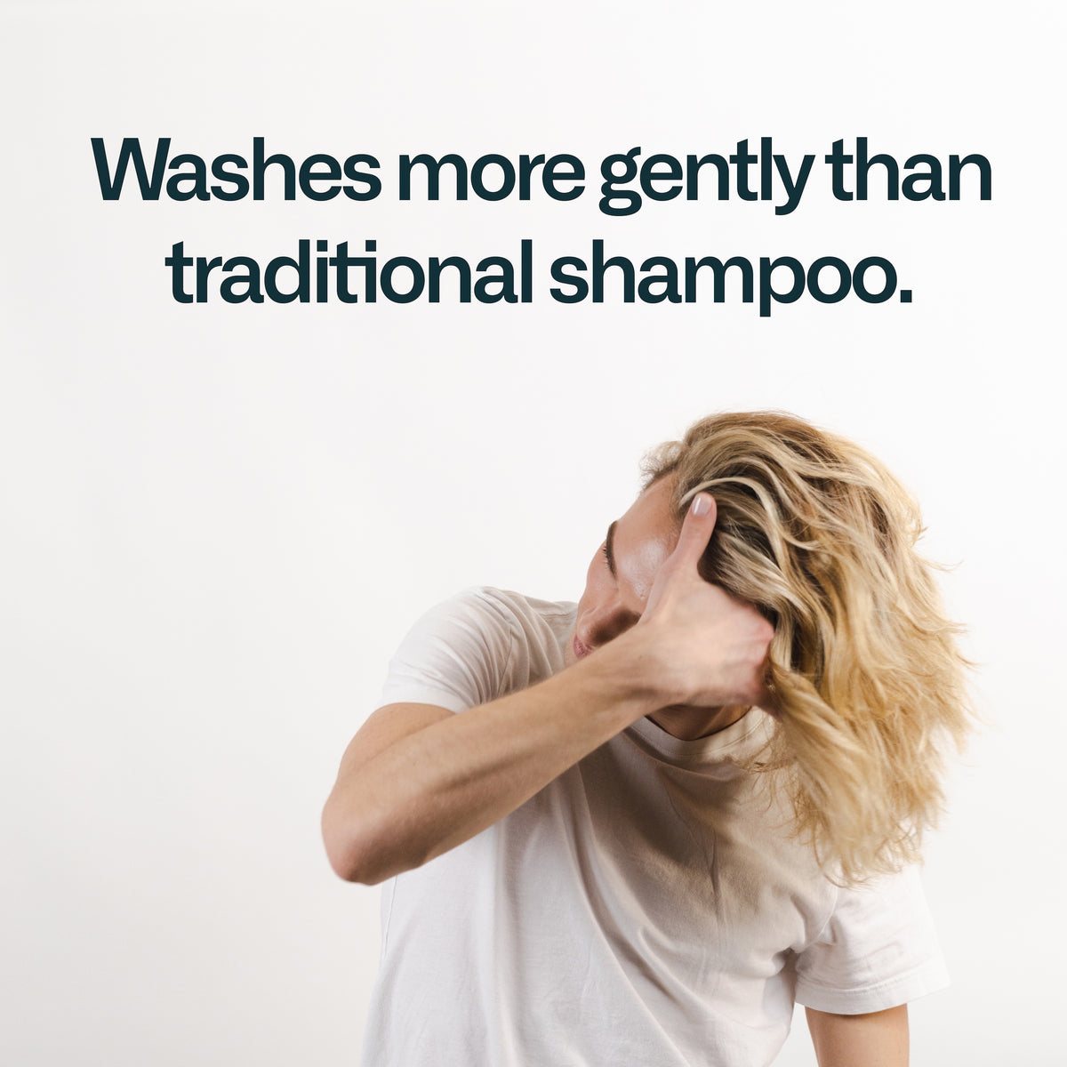 Washes more gently than traditional shampoo. Young person with long blonde hair running hand through hair.