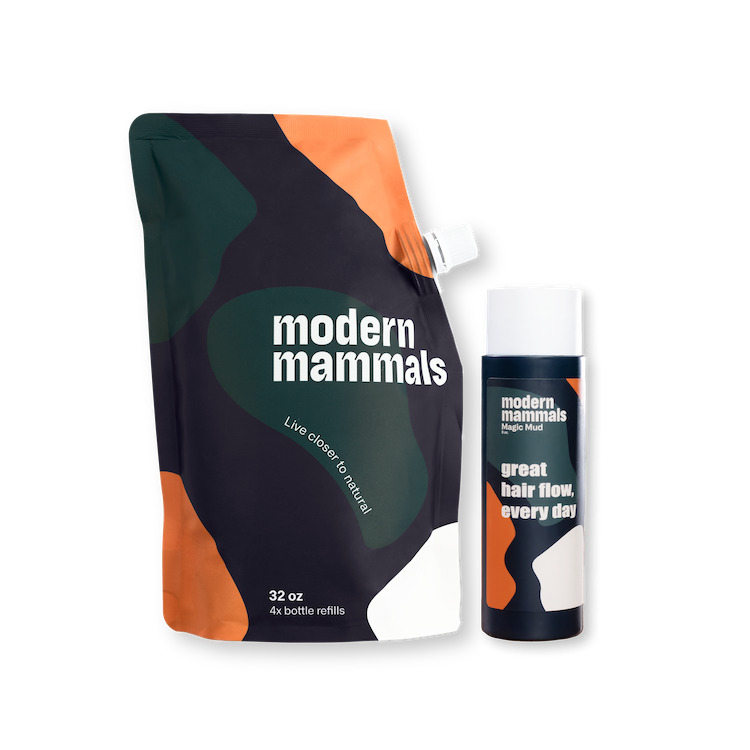 Modern Mammals hair care products: pouch with 'Live closer to natural' and bottle with 'great hair flow, every day'.