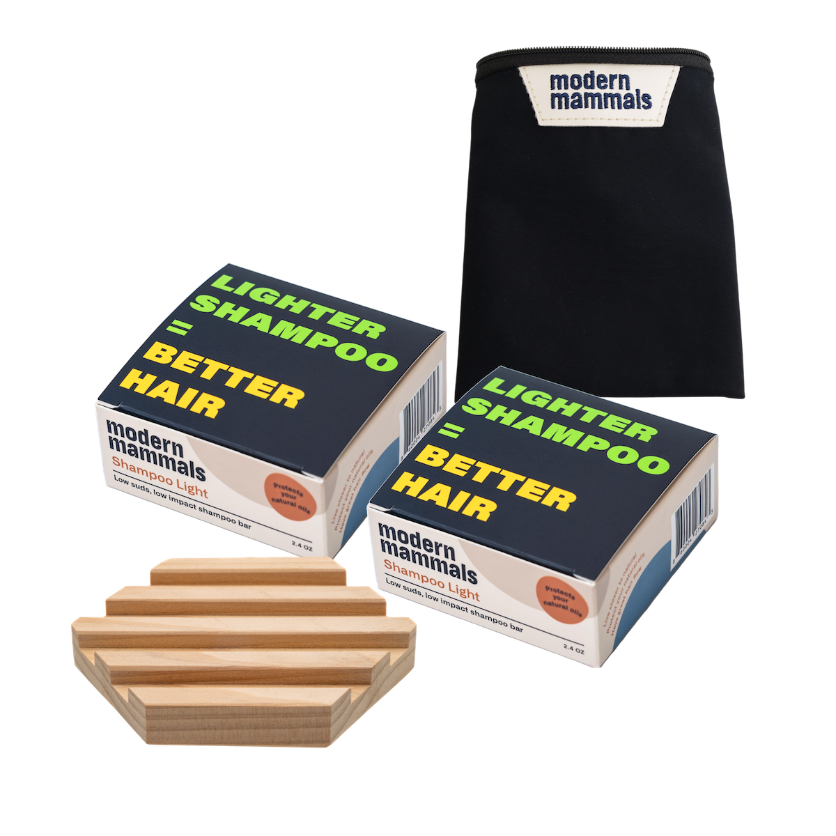 Front view of two boxed Shampoo Light bars with black pouch and wooden dish, box headline LIGHTER SHAMPOO = BETTER HAIR